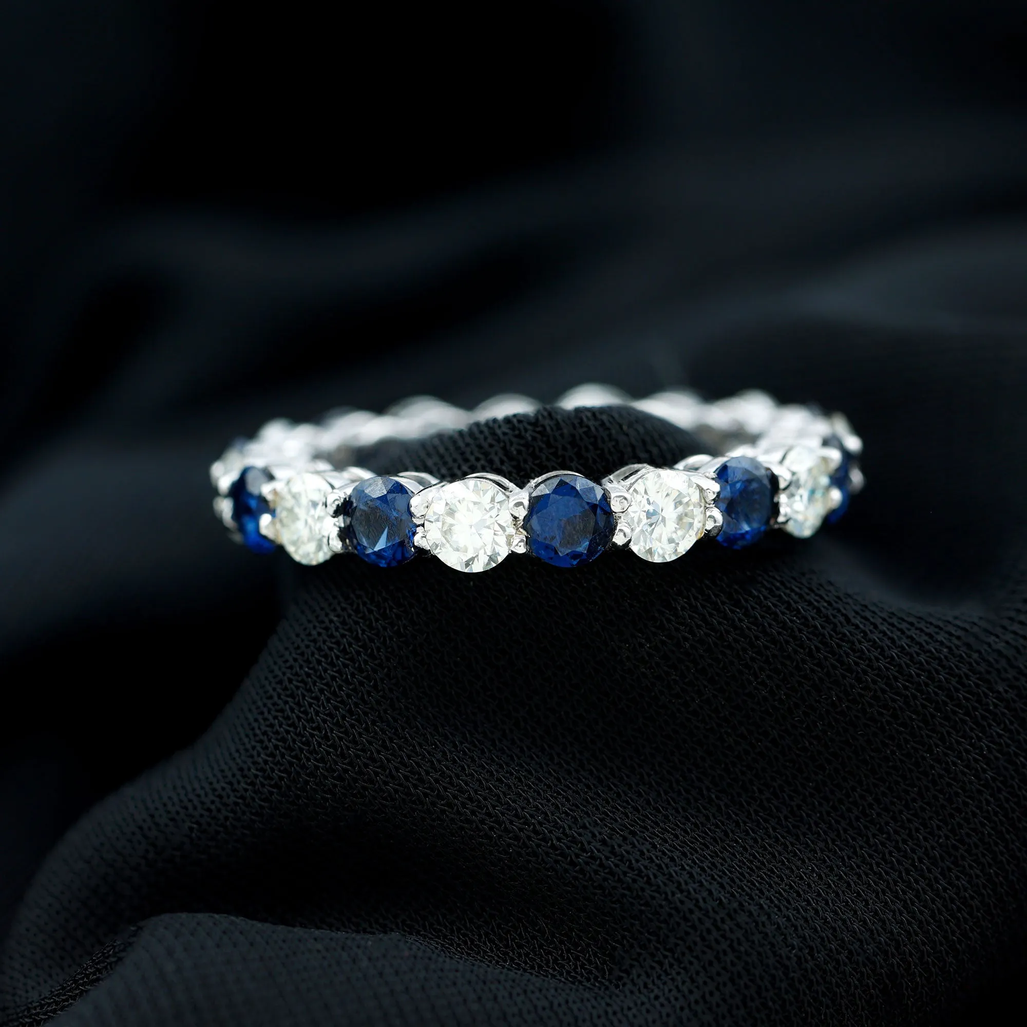 Alternating Created Blue Sapphire and Moissanite Eternity Ring